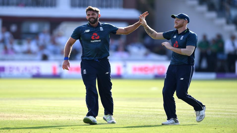 Liam Plunkett celebrates with Ben Stokes
